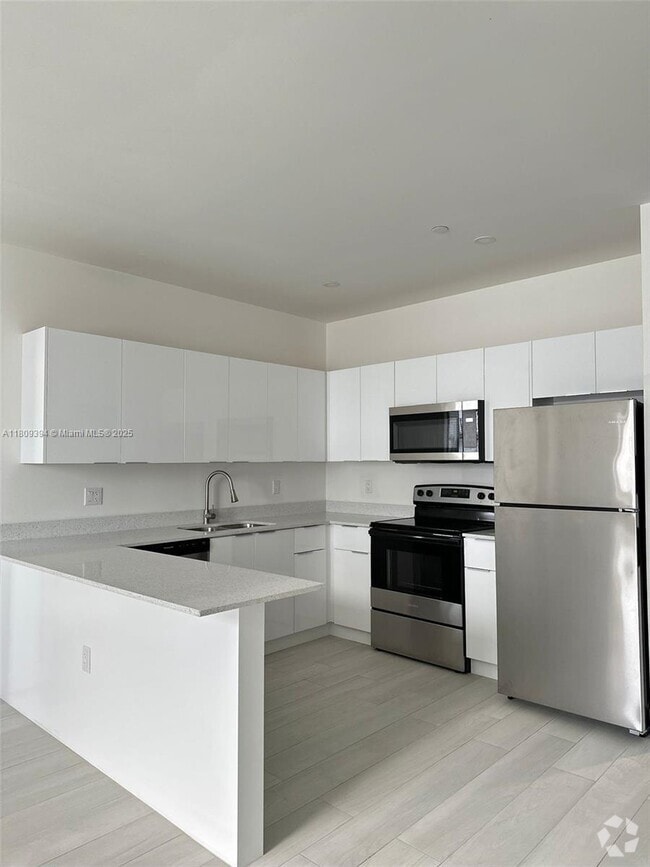 Building Photo - 909 E 24th St Unit 201 Rental