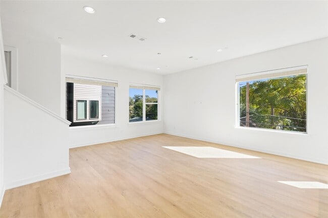 Photo - Modern 2-Bed Townhome with Attached Garage & Private Balcony in Gated Dallas Community Unit 3