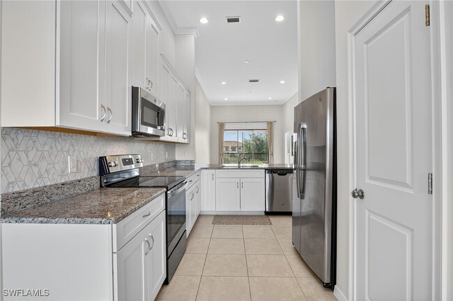 Building Photo - 9386 Pocida Ct Unit 202