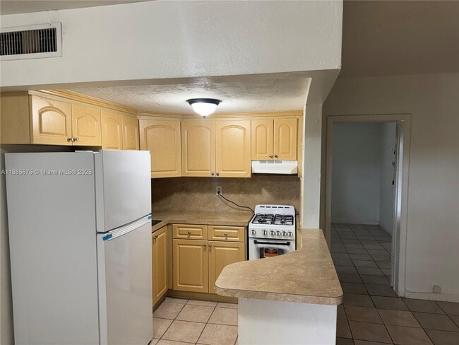 Photo - 1280 W 54th St Unit 310B