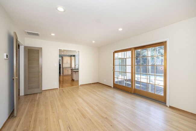 Photo - Spacious 3 Bed, 2.5 Bath Home in Quiet Neighborhood w/ AC + Pool!