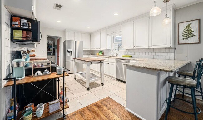 Photo - Spacious 4-Bedroom Home with Detached Work...