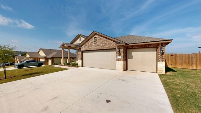 Photo - Discover this spacious 4-bedroom, 2-bath home with 3 CAR GARAGE!!!