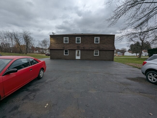 Parking lot at back of building - 237 Summit St N Unit #2