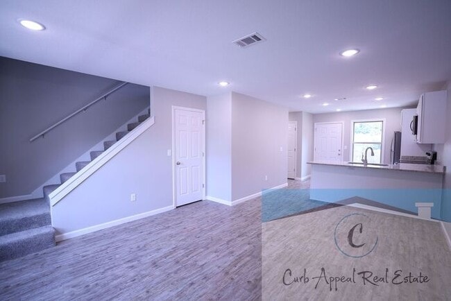 Photo - Move in special $800!! Beautiful 2 bed 2 bath duplex, includes washer and dryer - new construction!!