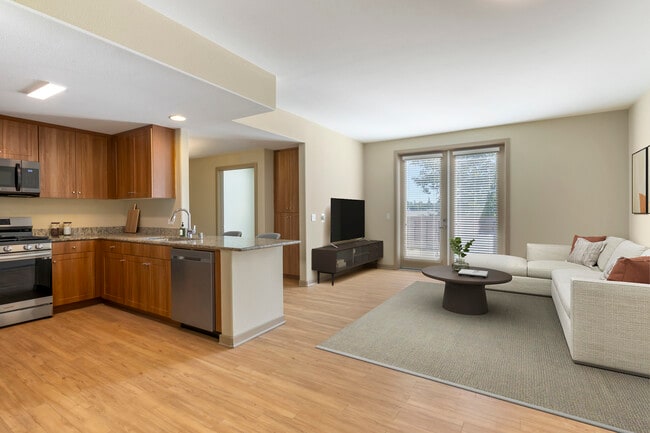 Acabados actualizados en cocina y sala de estar con pisos de superficie dura. - Avalon San Dimas