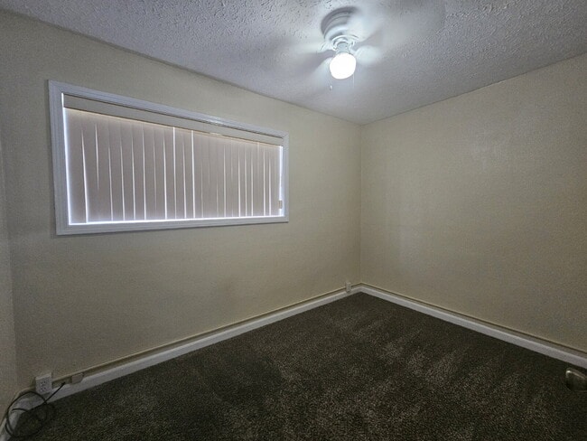 Photo - "Charming 3-Bedroom Retreat with Spacious Living"