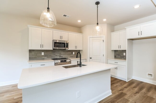 Photo - Beautiful 4BR 2.5BA Home w/ Full Appliance Kitchen • Garage Parking •