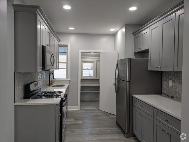 Building Photo - 9502 Avenue N Unit Downstairs Rental