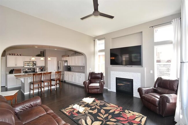 Kitchen and gas fireplace - 8782 Windy Plains Ct