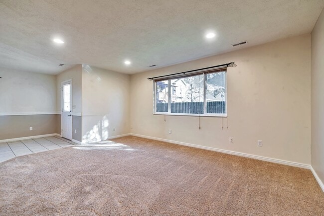 Photo - 3 Bed - 2.5 Bath, Beautiful Home in Ogden - Fully Fenced Yard! - Available on June 10th!