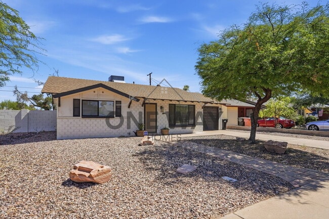 Photo - 8702 E Sheridan St