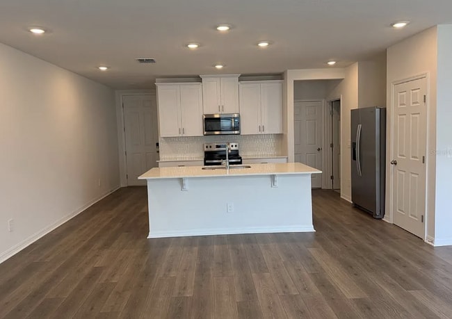 Photo - "Spacious 3-Bedroom Townhouse with Granite Elegance in St. Cloud – 4543 Rangeland Way"