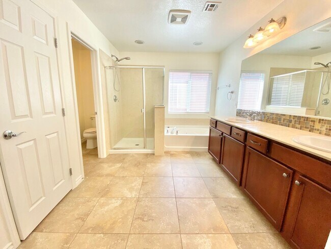 Photo - Inviting home with relaxing backyard spa in desirable Henderson location