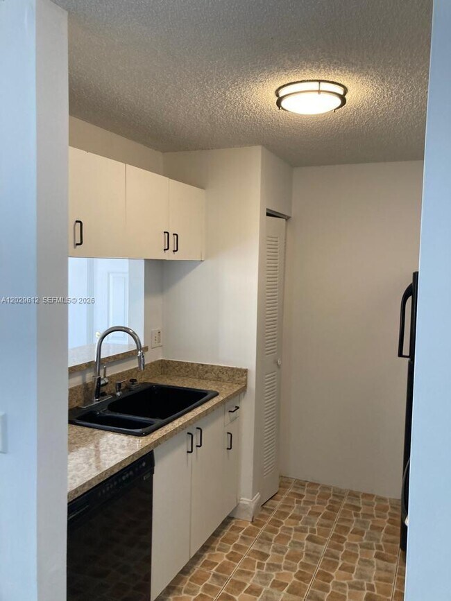 Photo - 1701 Village Blvd Unit 107