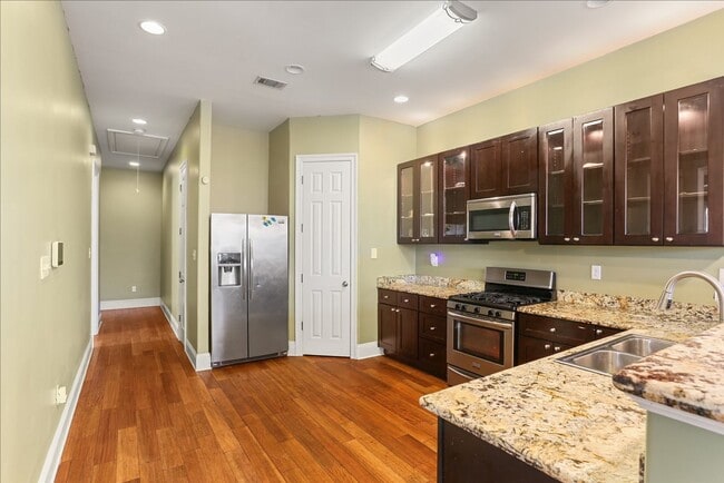 Photo - Three bedroom home with open floorplan, dining room, 3 bathrooms & parking !