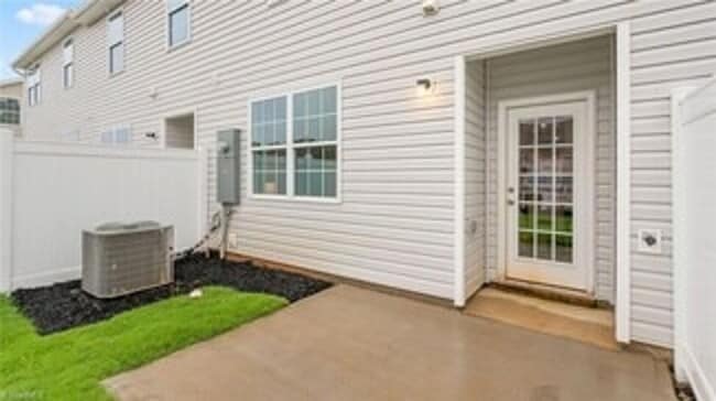 Photo - Modern 3-Bedroom Townhome with Garage in North Village Townes