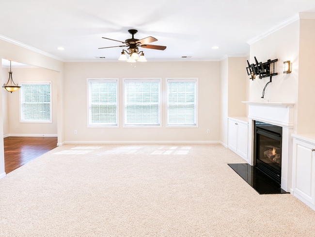 Entertainment-ready living space with surround sound connections available. - 2143 Somerset Pl SE