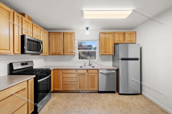 Photo - Cozy 2BR Corner Lot Home with Garage, Shed & Fenced Yard!