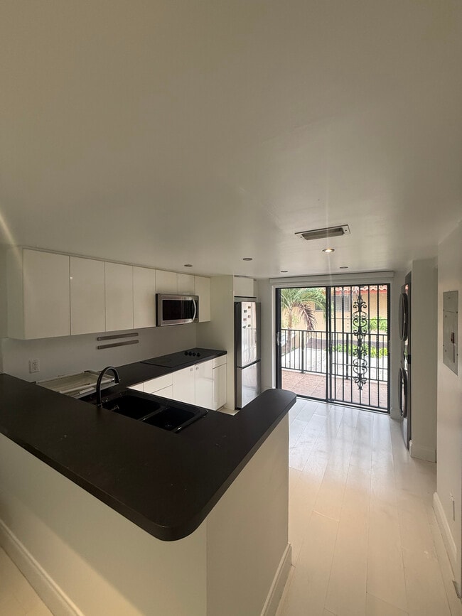 Photo - 2582 W 56th St Unit VALENCIA GARDENS