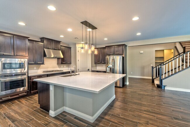 Photo - A unique Gem in Inspirada! 5 beds, 3 car, bedroom downstairs and Pool/spa!