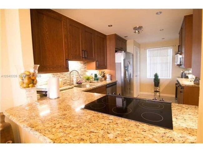 Building Photo - 4030 W Palm Aire Dr Unit 505