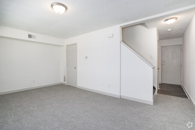 3BR, 1BA - 1,003SF - Living Room - SkyView