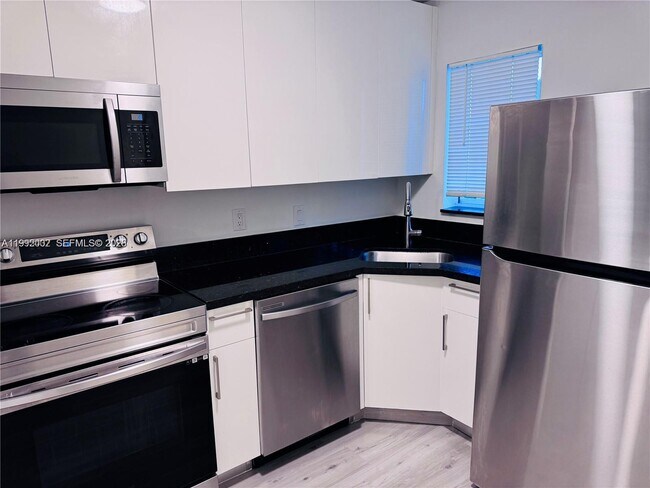 Photo - 2660 W 76th St Unit 207