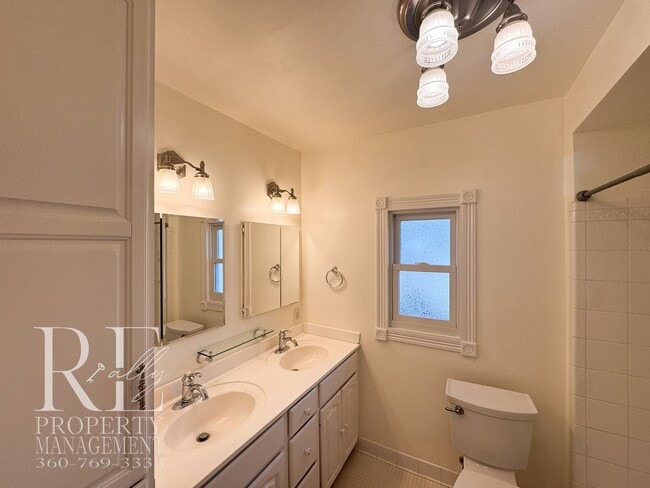 Photo - Timeless Charm Meets Space & Storage in This Character-Filled Bremeton Home