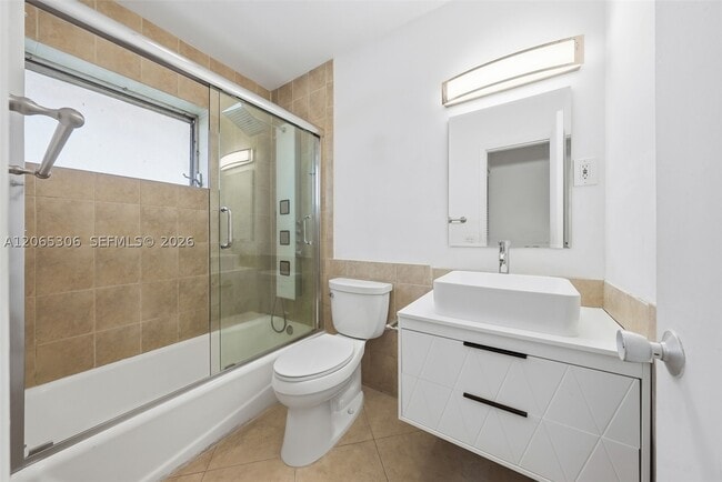 Building Photo - 7434 Harding Ave Unit 9
