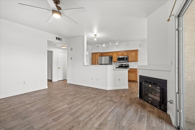 Photo - Charming 2-Bedroom First Floor Featuring Open Layout, Fireplace, Patio & Community Pool