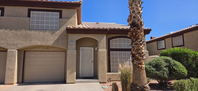 Building Photo - Two story 2 bedroom townhome with newer flooring, paint & appliances - community pool!