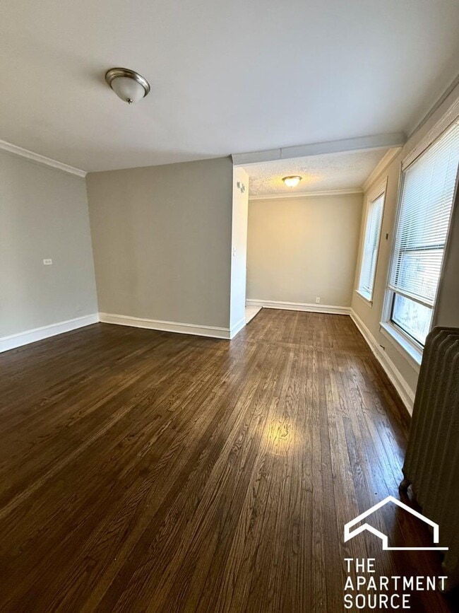 Building Photo - 6959 S Paxton Ave Unit 1C