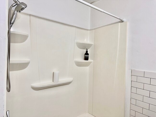 Updated bathroom - clean, modern aesthetic. - 353 High St