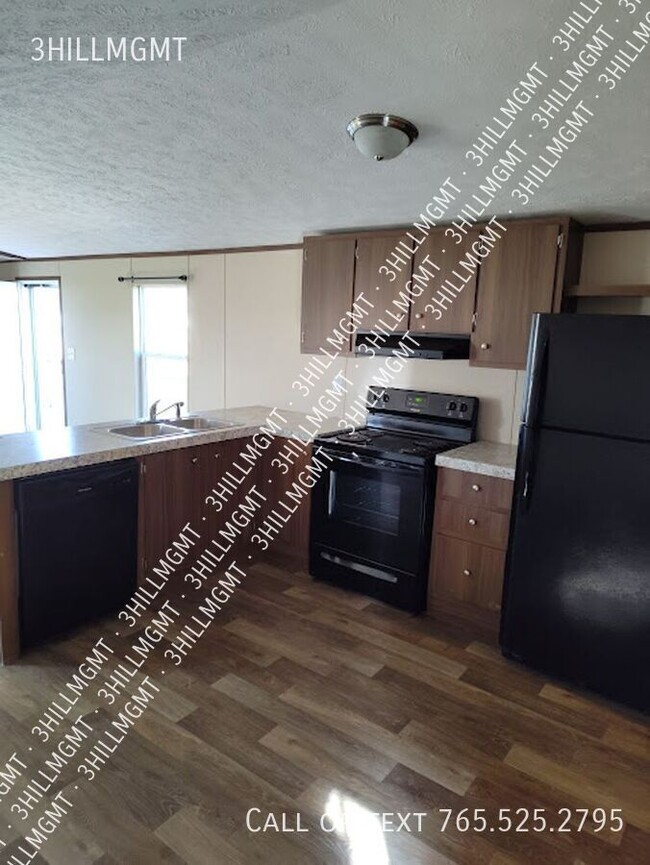 Building Photo - 5600 W Kilgore Ave Unit #95