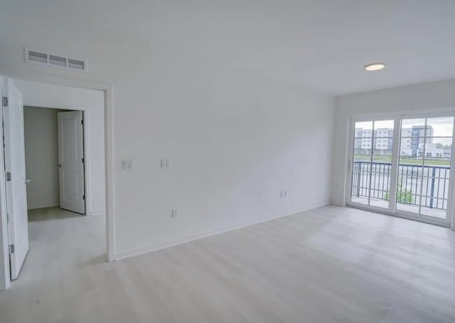 Photo - Top Floor Corner Unit – Brand New 3/2 Condo with Balcony in Millenia Park *** Only $1995/mo ***