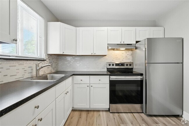Building Photo - 793 NW 91st St Unit 1 Rental