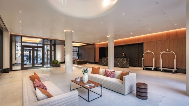 Welcome to Mabel, where modern design meets comfort. Our inviting lobby features stylish furnishings and warm lighting, creating the perfect environment for relaxation and connection. Explore what Mabel has to offer today! Schedule a visit now.
