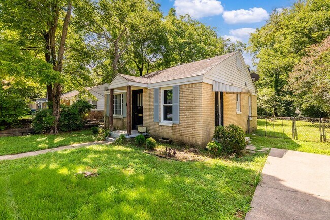 Photo - Charming 2BR/1BA Brick Cottage — Hardwoods, Fenced Yard, W/D Included