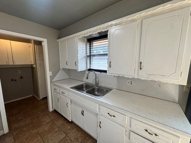 Photo - 2 bed , 1 and a 1/2 bath, garage conversion with two living rooms and a storage space! Moore scho...