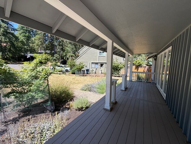 Photo - Spacious 4BR/3BA Home with Deck, Fenced Yard & Garage