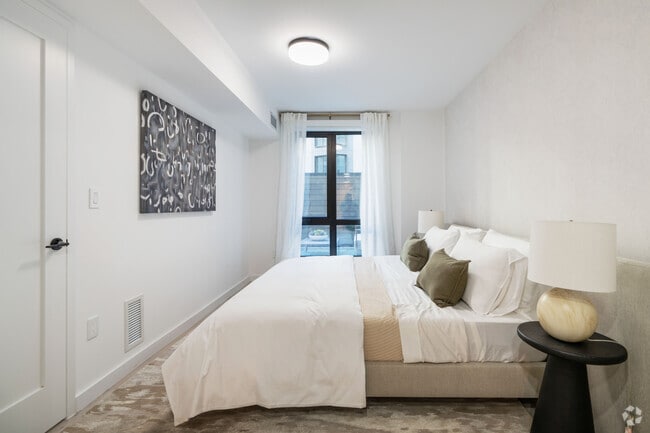 3BR, 2BA - 1,243SF - Primary Bedroom