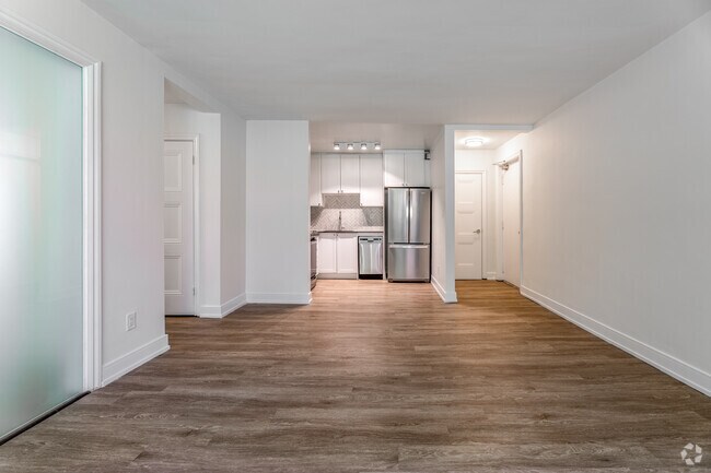 2BR, 1BA + Den - Living Room - 3015 & 3017 Queen St E