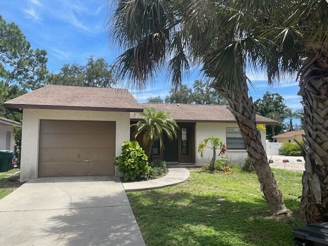 Building Photo - Open and bright 2/2 with garage