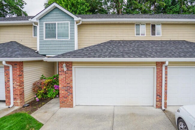 THREE BEDROOM TOWNHOME WITH GARAGE ACROSS FROM SHOPPING AND DINING