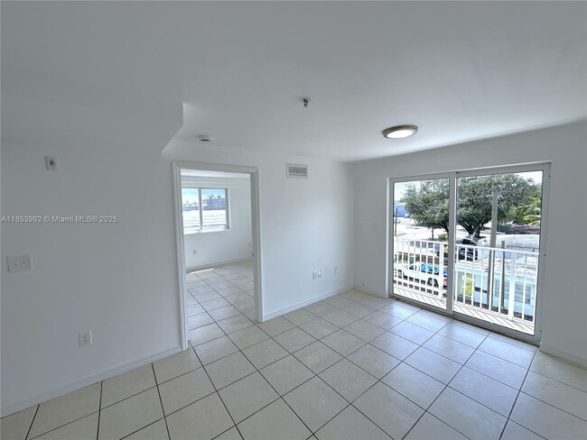 Building Photo - 2401 NW 23 St Unit 301 Rental