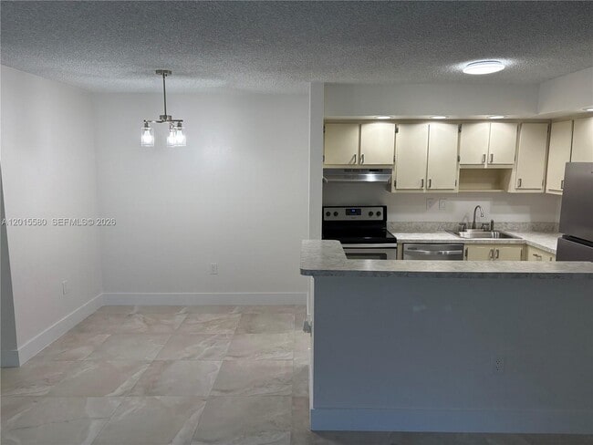 Photo - 18875 NW 62nd Ave Unit 105