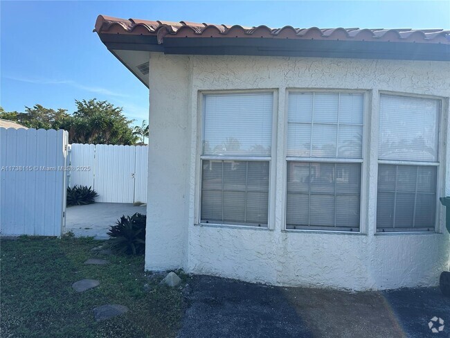 Building Photo - 5730 NW 199th St Unit REAR Rental