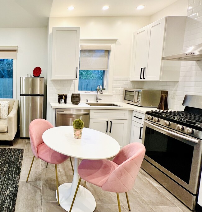 Full size appliances - fridge, oven, dishwasher, microwave and air fryer - 4206 Pomona Ave