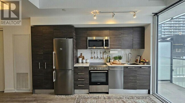 Photo - 28 Wellesley St E Unité 2208